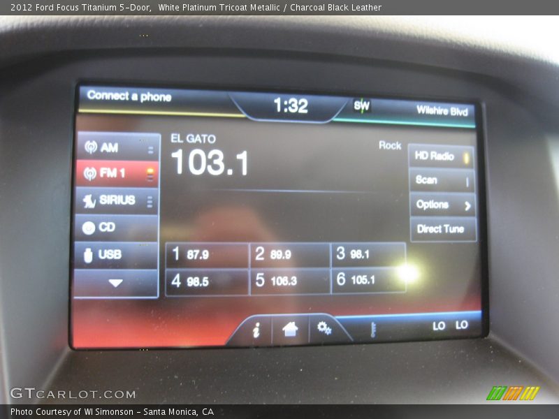 White Platinum Tricoat Metallic / Charcoal Black Leather 2012 Ford Focus Titanium 5-Door