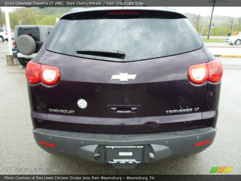 Dark Cherry Metallic / Dark Gray/Light Gray 2010 Chevrolet Traverse LT AWD
