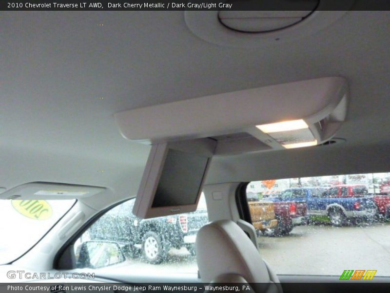 Dark Cherry Metallic / Dark Gray/Light Gray 2010 Chevrolet Traverse LT AWD