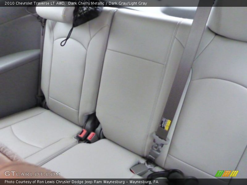 Dark Cherry Metallic / Dark Gray/Light Gray 2010 Chevrolet Traverse LT AWD