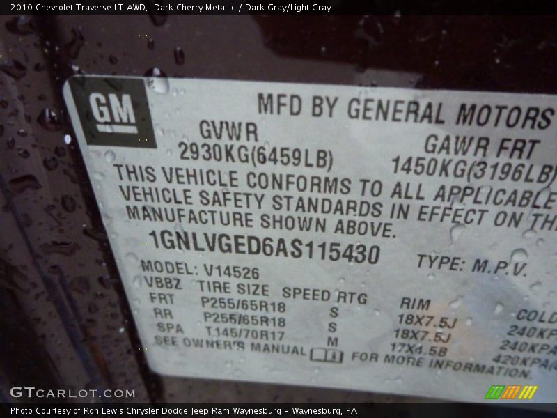 Dark Cherry Metallic / Dark Gray/Light Gray 2010 Chevrolet Traverse LT AWD