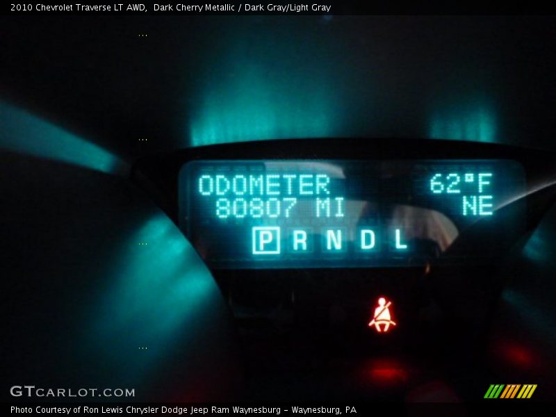 Dark Cherry Metallic / Dark Gray/Light Gray 2010 Chevrolet Traverse LT AWD