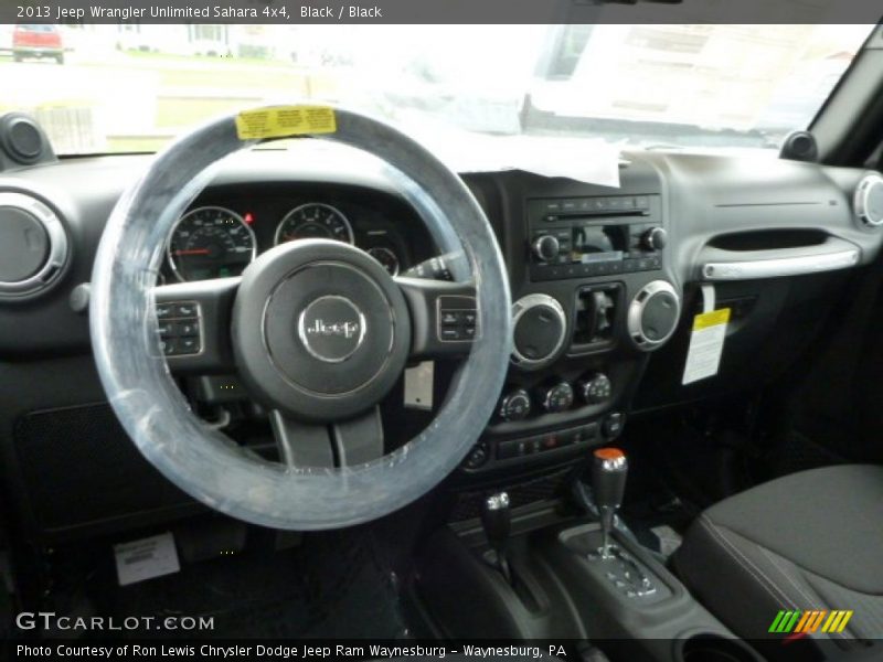 Black / Black 2013 Jeep Wrangler Unlimited Sahara 4x4