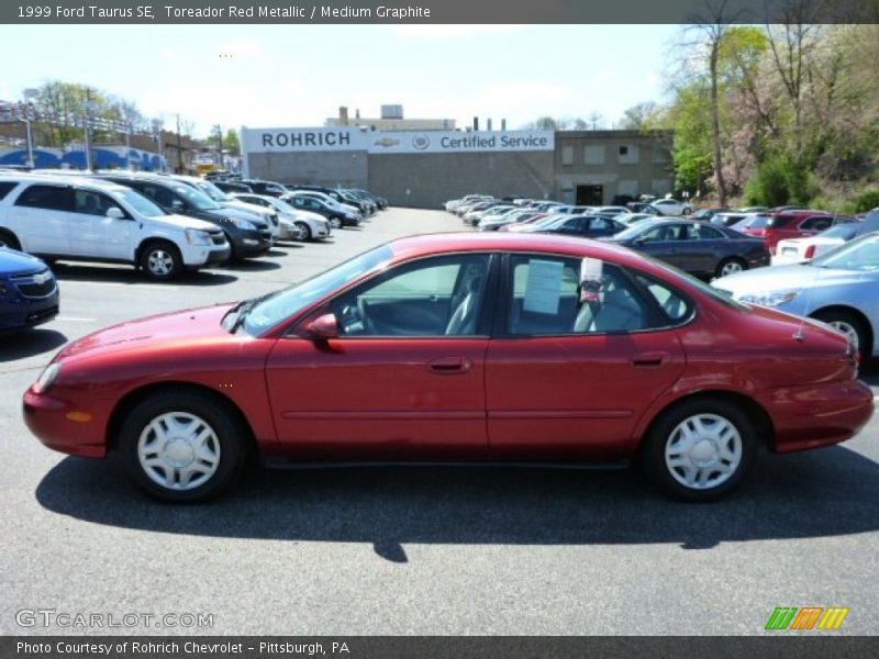 Toreador Red Metallic / Medium Graphite 1999 Ford Taurus SE