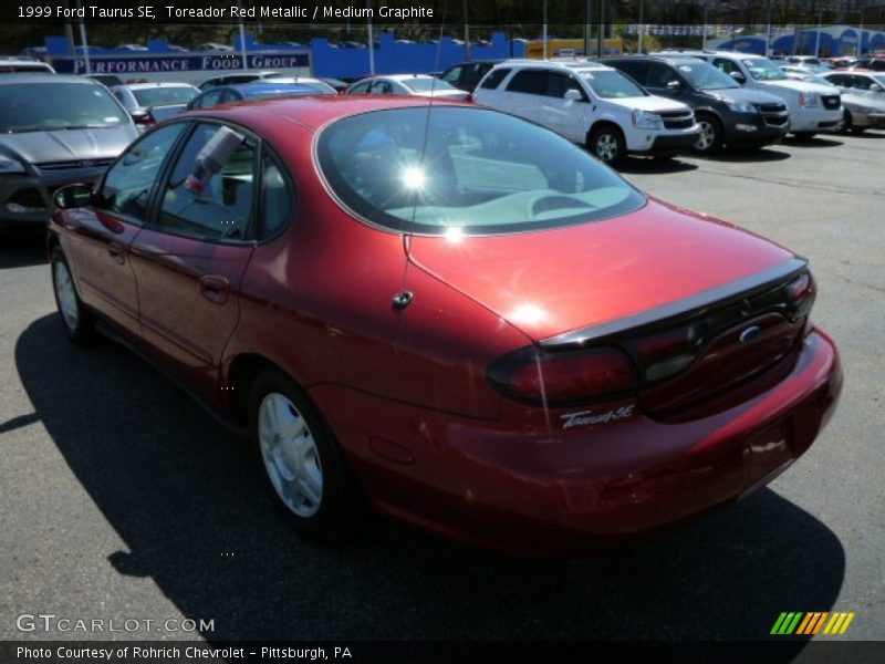 Toreador Red Metallic / Medium Graphite 1999 Ford Taurus SE