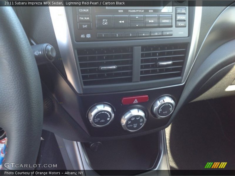 Lightning Red Pearl / Carbon Black 2011 Subaru Impreza WRX Sedan