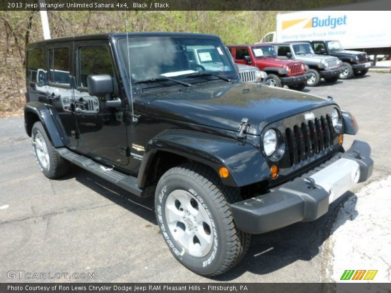 Black / Black 2013 Jeep Wrangler Unlimited Sahara 4x4