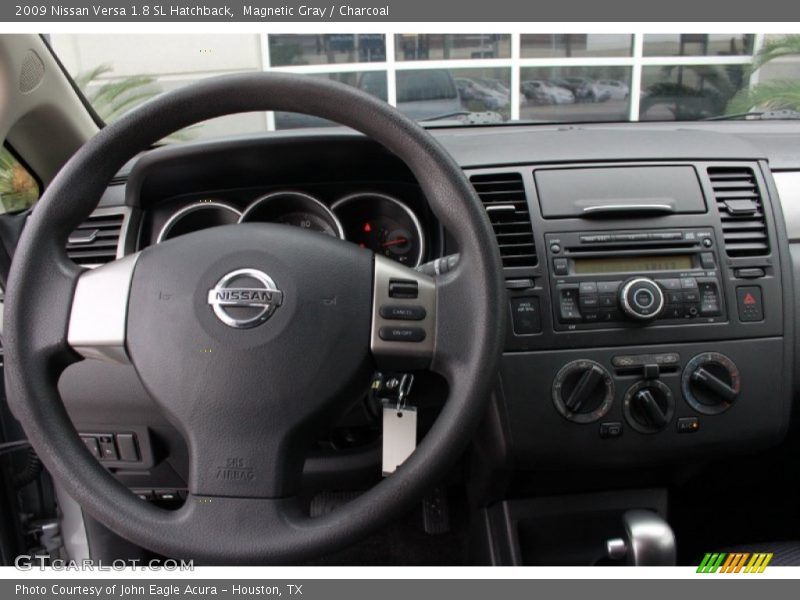 Magnetic Gray / Charcoal 2009 Nissan Versa 1.8 SL Hatchback