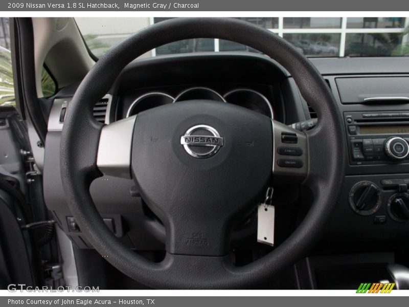 Magnetic Gray / Charcoal 2009 Nissan Versa 1.8 SL Hatchback