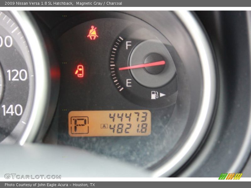 Magnetic Gray / Charcoal 2009 Nissan Versa 1.8 SL Hatchback