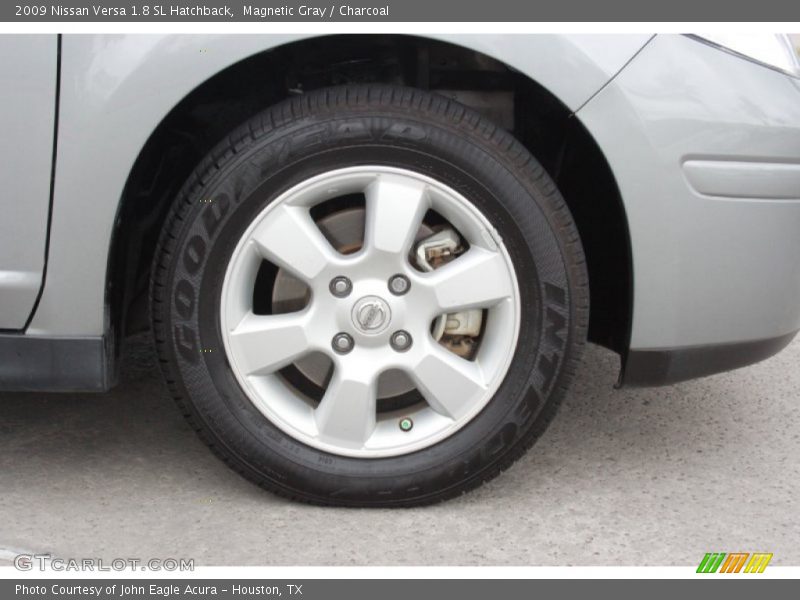 Magnetic Gray / Charcoal 2009 Nissan Versa 1.8 SL Hatchback