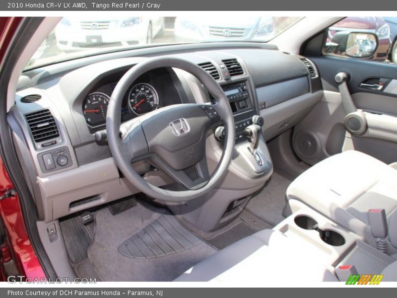 Tango Red Pearl / Gray 2010 Honda CR-V LX AWD