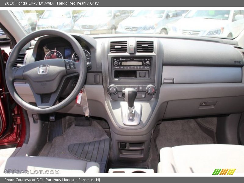 Tango Red Pearl / Gray 2010 Honda CR-V LX AWD