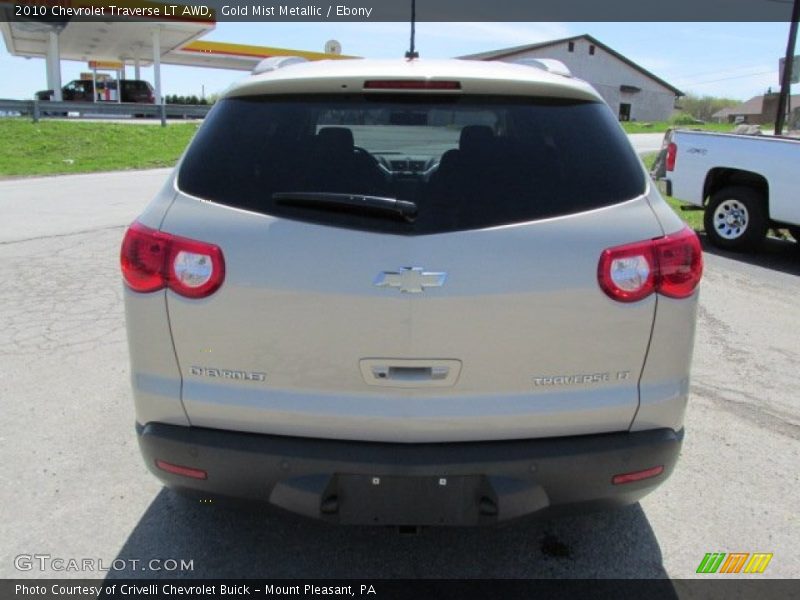 Gold Mist Metallic / Ebony 2010 Chevrolet Traverse LT AWD