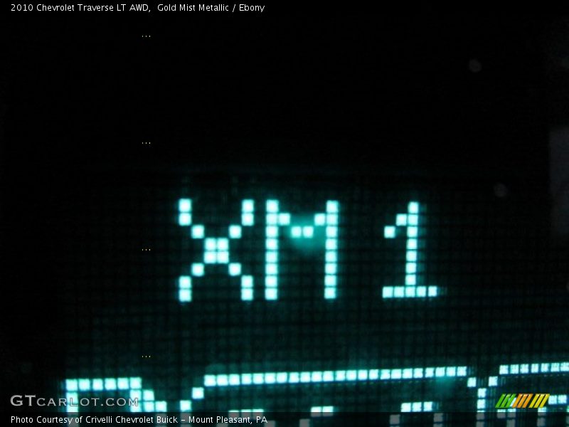 Gold Mist Metallic / Ebony 2010 Chevrolet Traverse LT AWD