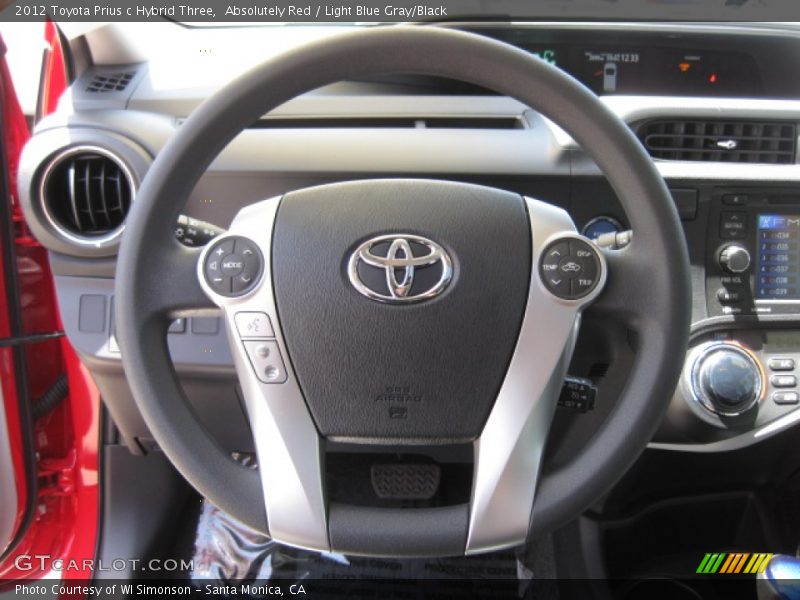 Absolutely Red / Light Blue Gray/Black 2012 Toyota Prius c Hybrid Three