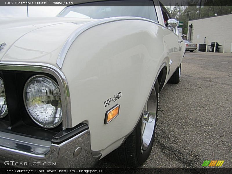 White / Red 1969 Oldsmobile Cutlass S