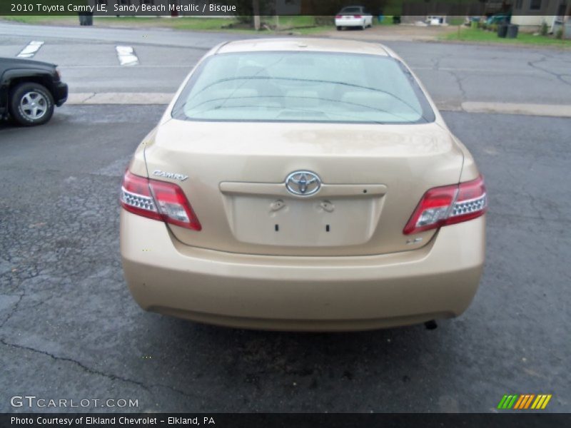 Sandy Beach Metallic / Bisque 2010 Toyota Camry LE