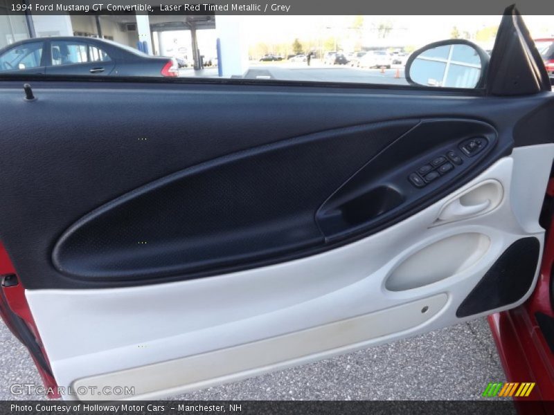Laser Red Tinted Metallic / Grey 1994 Ford Mustang GT Convertible