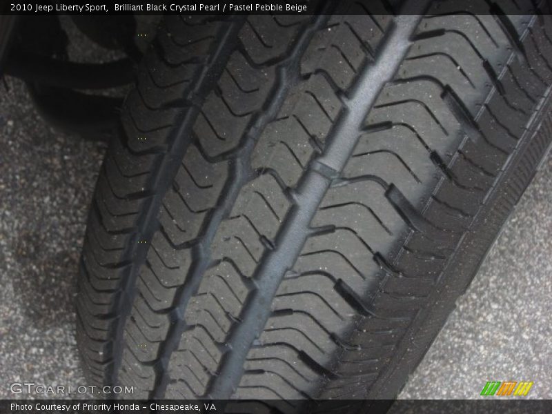 Brilliant Black Crystal Pearl / Pastel Pebble Beige 2010 Jeep Liberty Sport