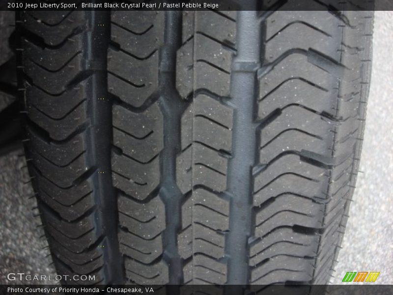 Brilliant Black Crystal Pearl / Pastel Pebble Beige 2010 Jeep Liberty Sport