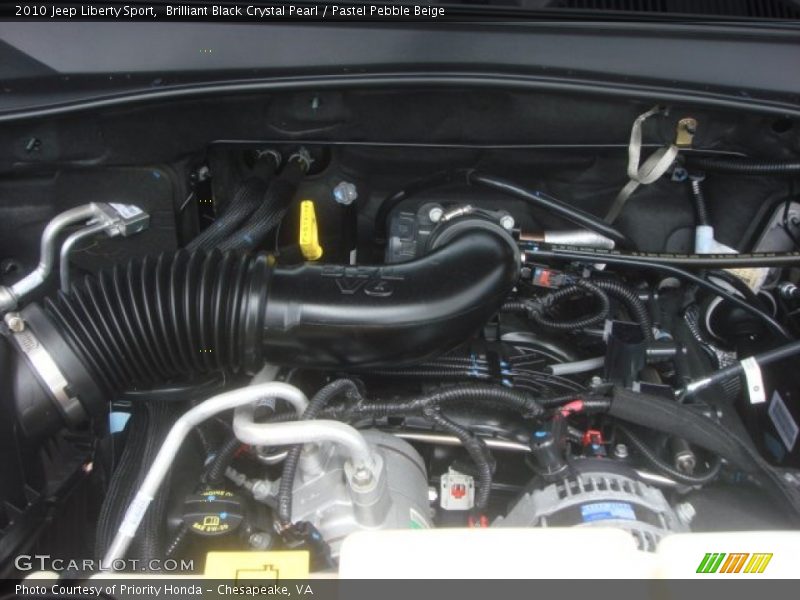 Brilliant Black Crystal Pearl / Pastel Pebble Beige 2010 Jeep Liberty Sport