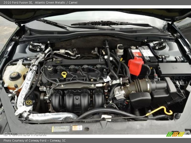 Atlantis Green Metallic / Camel 2010 Ford Fusion SE