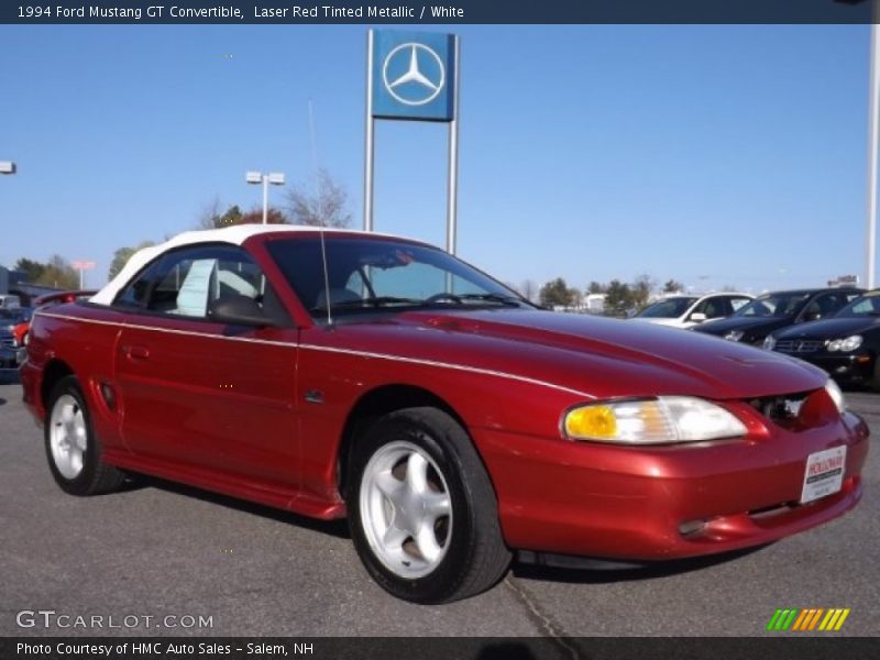 Laser Red Tinted Metallic / White 1994 Ford Mustang GT Convertible