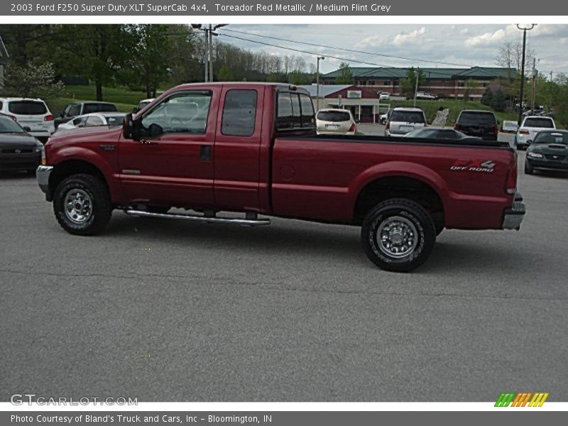 Toreador Red Metallic / Medium Flint Grey 2003 Ford F250 Super Duty XLT SuperCab 4x4