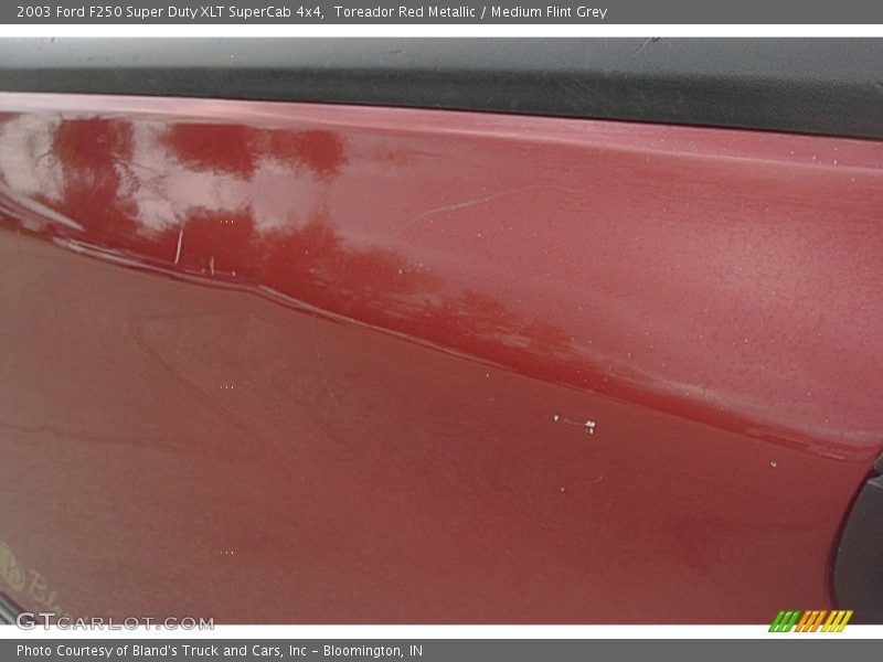 Toreador Red Metallic / Medium Flint Grey 2003 Ford F250 Super Duty XLT SuperCab 4x4