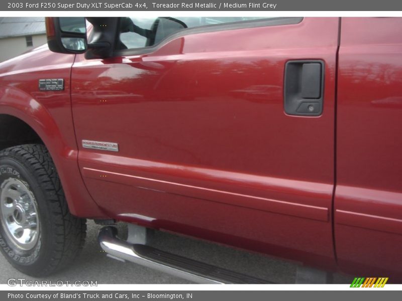 Toreador Red Metallic / Medium Flint Grey 2003 Ford F250 Super Duty XLT SuperCab 4x4