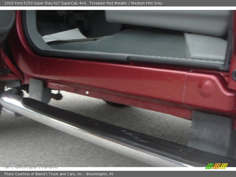 Toreador Red Metallic / Medium Flint Grey 2003 Ford F250 Super Duty XLT SuperCab 4x4