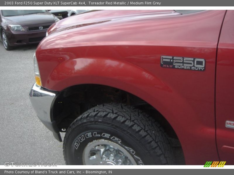 Toreador Red Metallic / Medium Flint Grey 2003 Ford F250 Super Duty XLT SuperCab 4x4