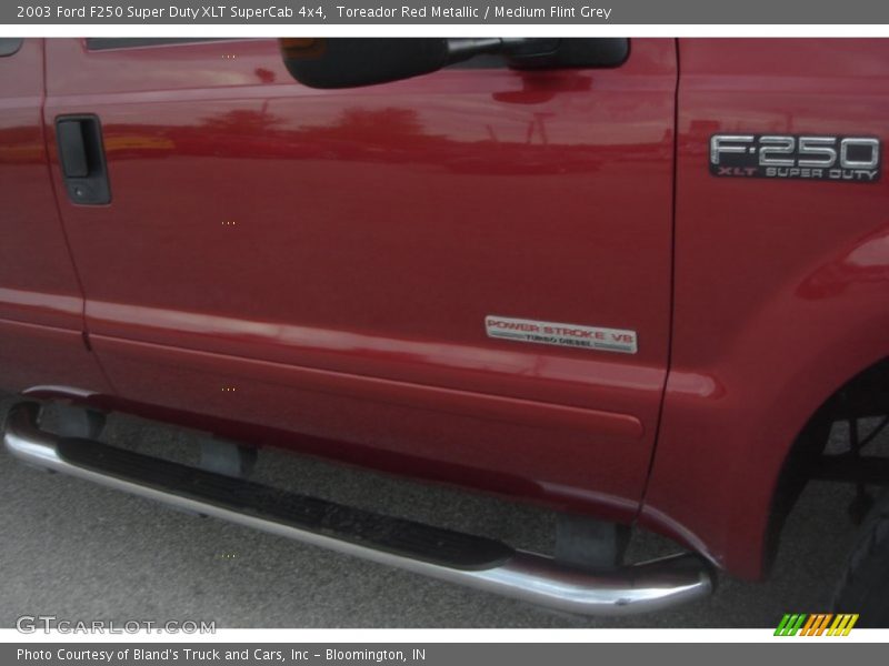 Toreador Red Metallic / Medium Flint Grey 2003 Ford F250 Super Duty XLT SuperCab 4x4