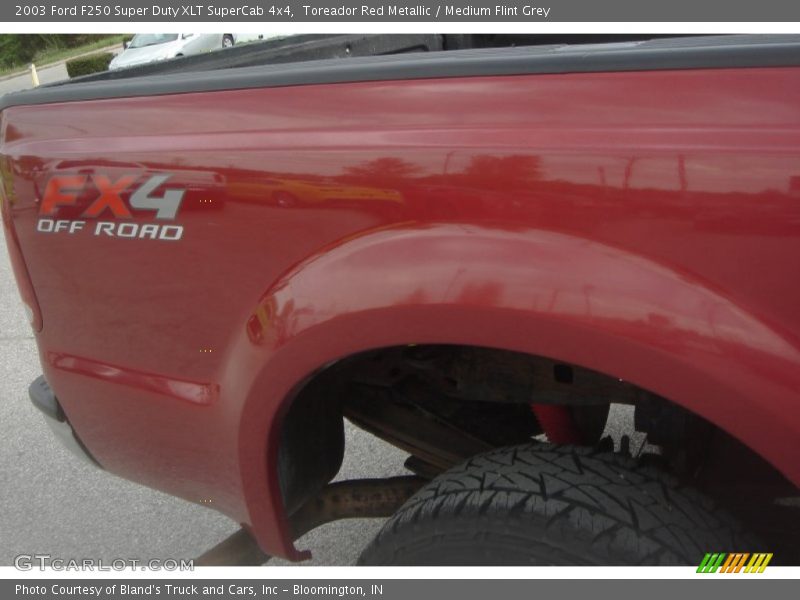 Toreador Red Metallic / Medium Flint Grey 2003 Ford F250 Super Duty XLT SuperCab 4x4