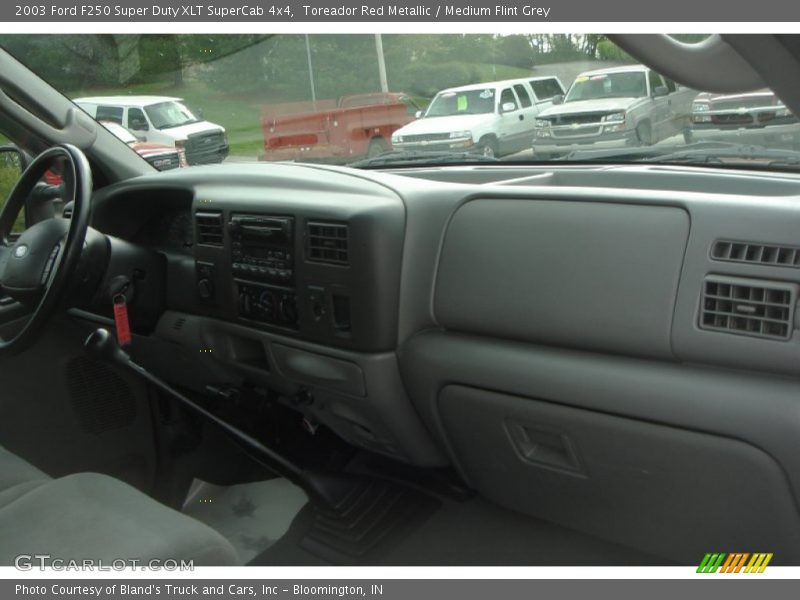 Toreador Red Metallic / Medium Flint Grey 2003 Ford F250 Super Duty XLT SuperCab 4x4