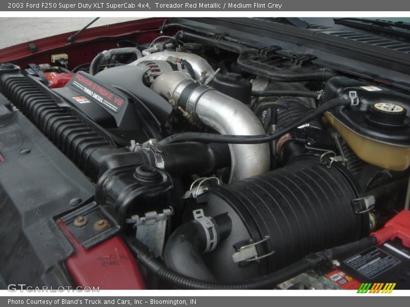 Toreador Red Metallic / Medium Flint Grey 2003 Ford F250 Super Duty XLT SuperCab 4x4