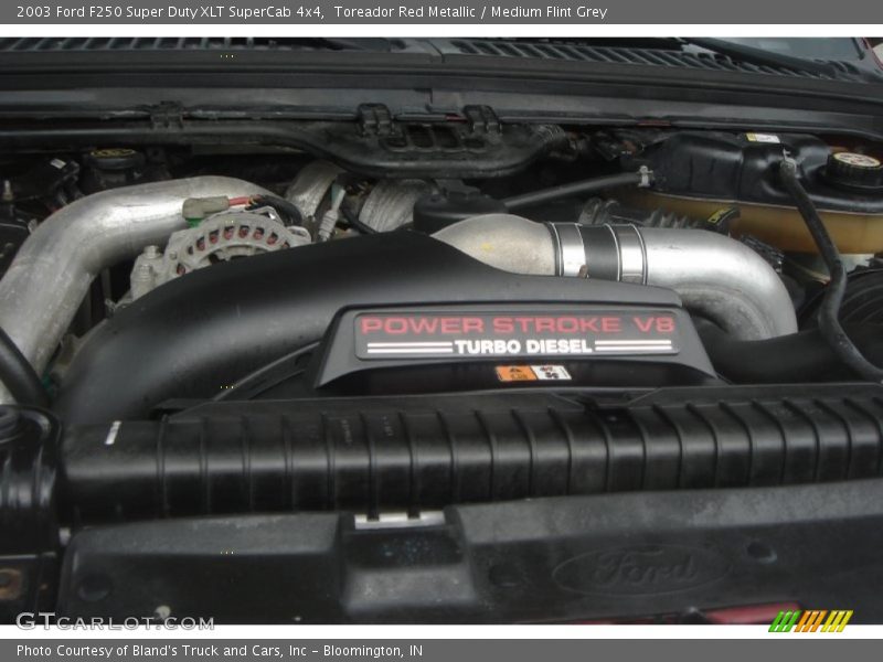Toreador Red Metallic / Medium Flint Grey 2003 Ford F250 Super Duty XLT SuperCab 4x4