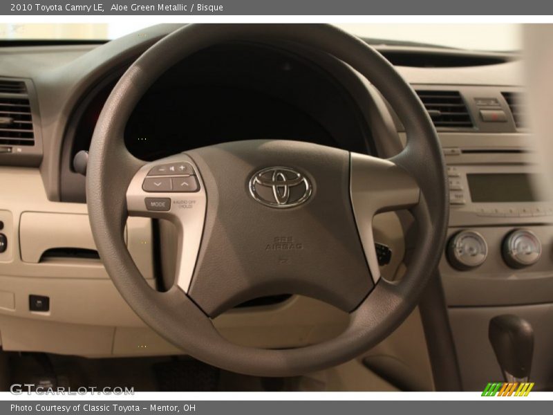 Aloe Green Metallic / Bisque 2010 Toyota Camry LE