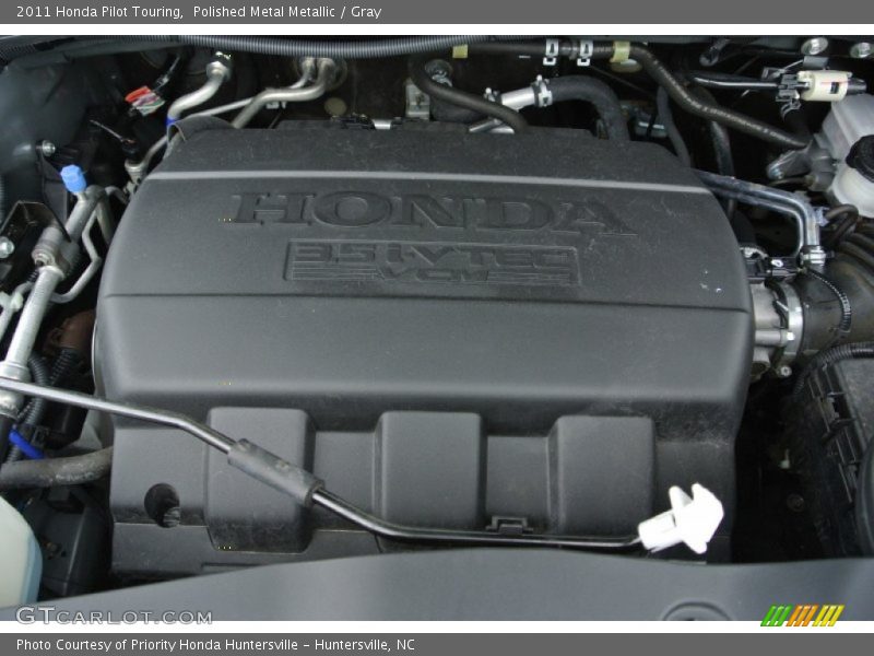 Polished Metal Metallic / Gray 2011 Honda Pilot Touring