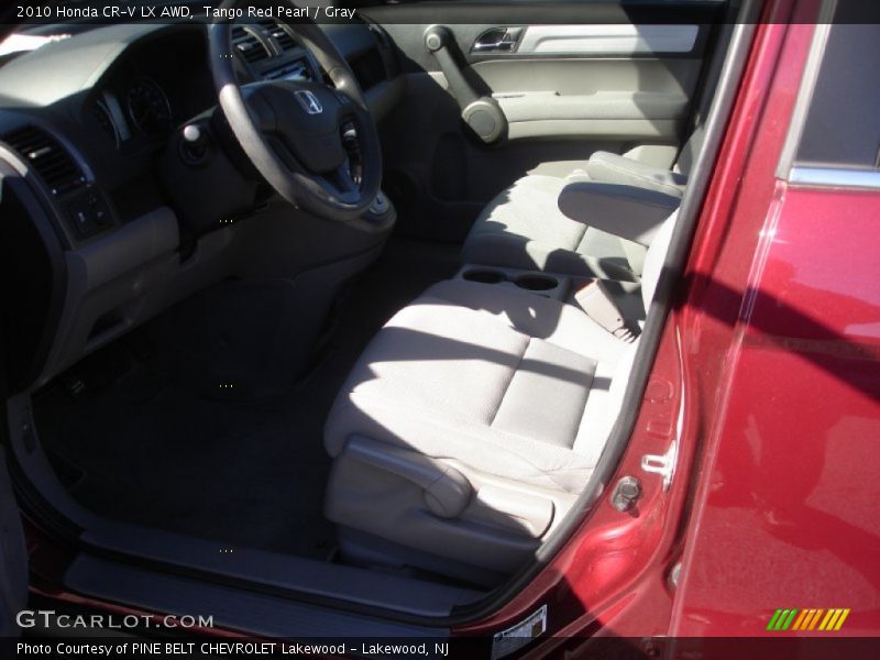 Tango Red Pearl / Gray 2010 Honda CR-V LX AWD