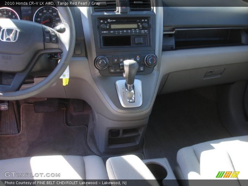 Tango Red Pearl / Gray 2010 Honda CR-V LX AWD