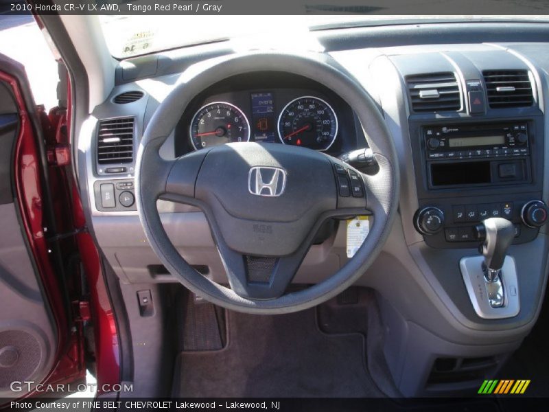 Tango Red Pearl / Gray 2010 Honda CR-V LX AWD