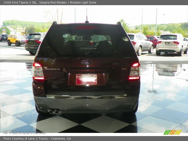 Sangria Red Metallic / Medium Light Stone 2009 Ford Taurus X SEL