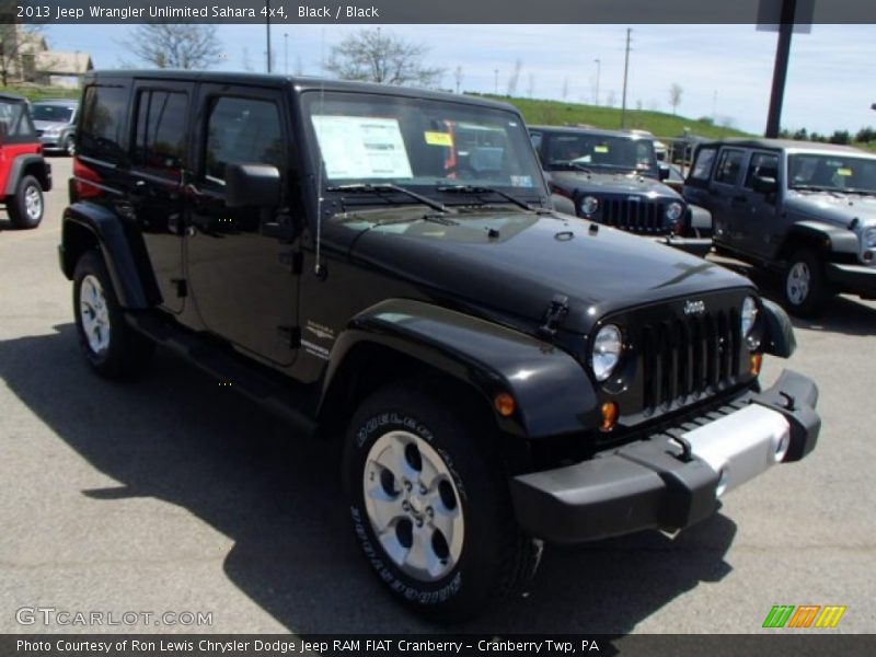 Black / Black 2013 Jeep Wrangler Unlimited Sahara 4x4