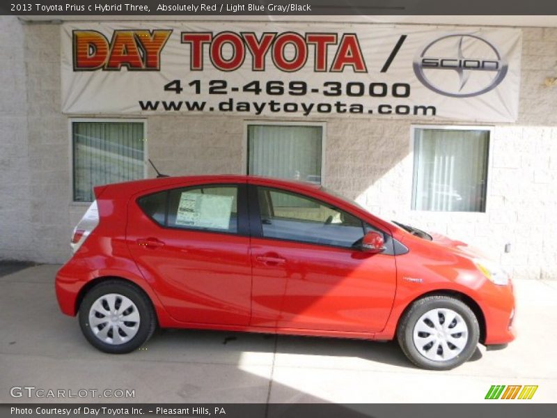 Absolutely Red / Light Blue Gray/Black 2013 Toyota Prius c Hybrid Three