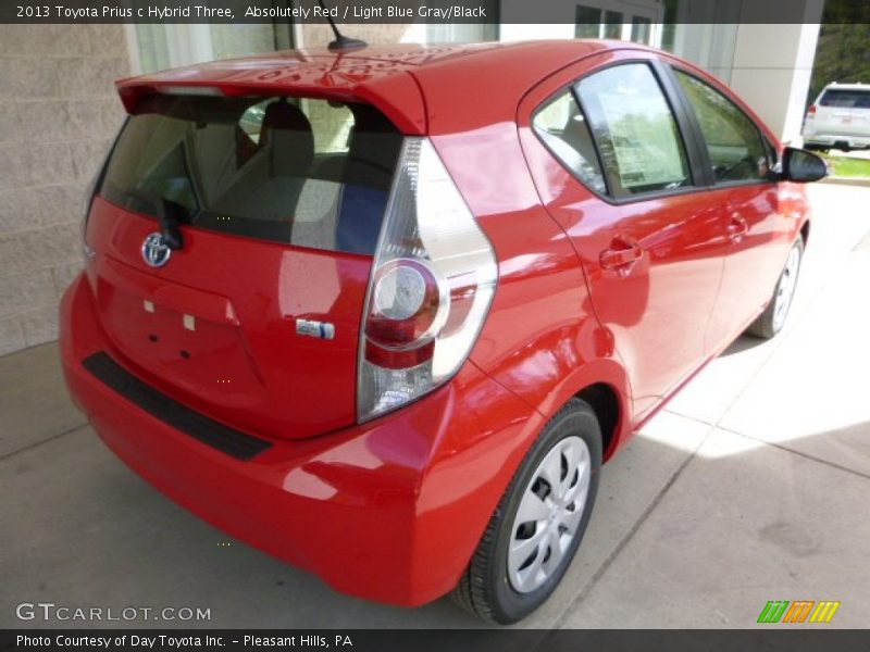 Absolutely Red / Light Blue Gray/Black 2013 Toyota Prius c Hybrid Three