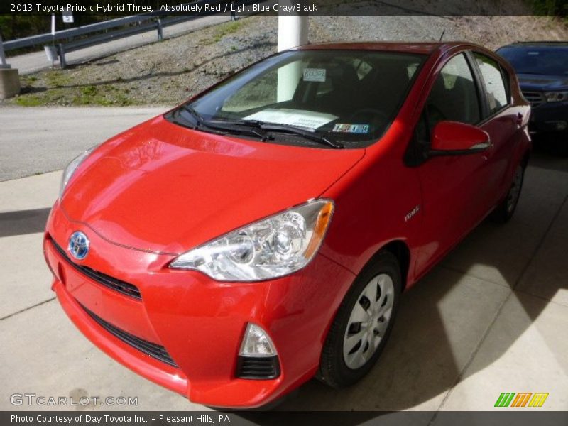 Absolutely Red / Light Blue Gray/Black 2013 Toyota Prius c Hybrid Three