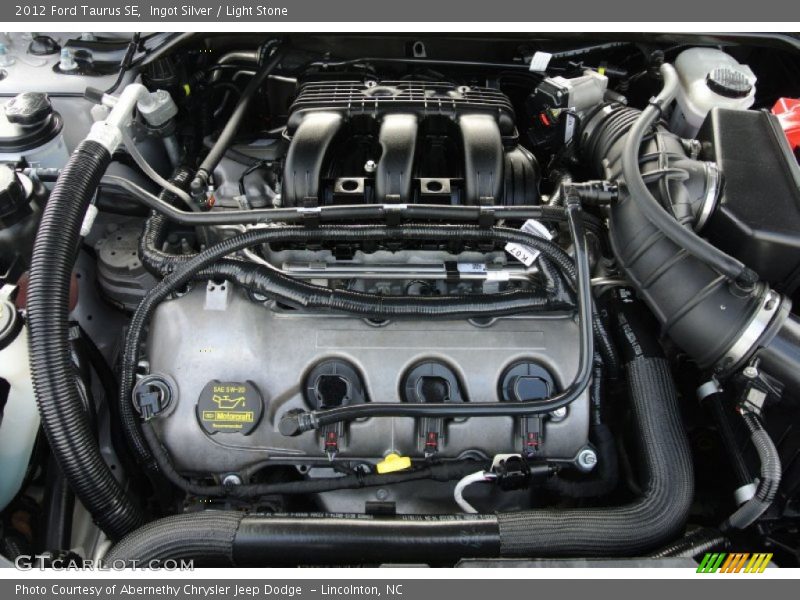 Ingot Silver / Light Stone 2012 Ford Taurus SE