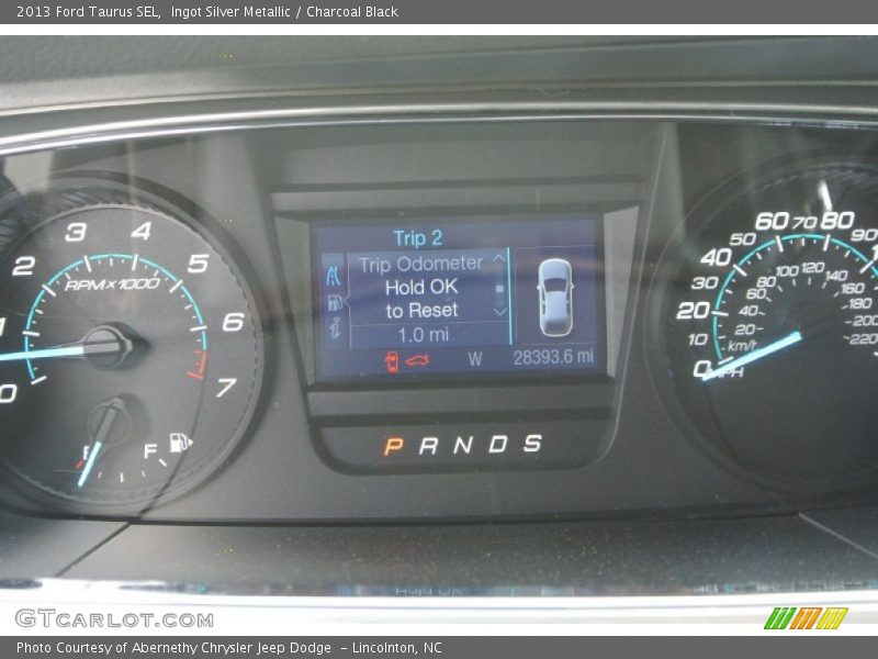 Ingot Silver Metallic / Charcoal Black 2013 Ford Taurus SEL